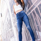 Le paris, jeans bleu avec trou au genou pour femmes, coupe skinny 